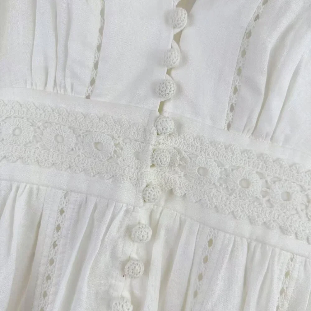 Romantic White Lace Dress: V - Neck, Puff Sleeves & Tiered Skirt - Picture 3 of 8